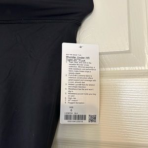 BNWT Lulemon Wunder Under HR tight 25” flux. Size 6, black